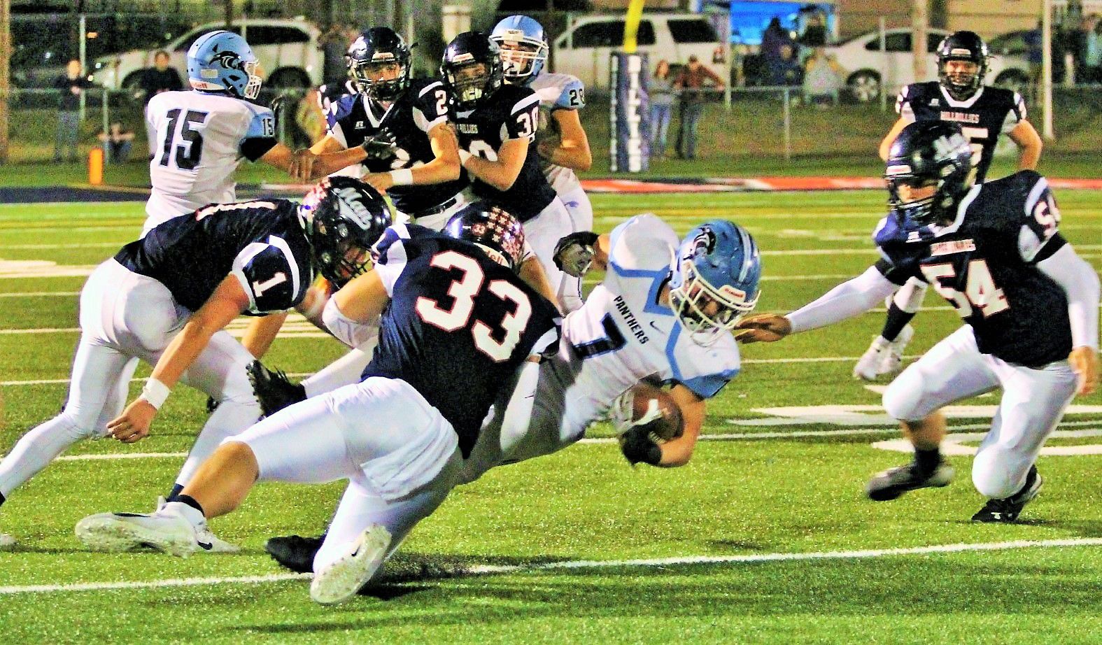 20191009-log-man lc game tackle sam milton